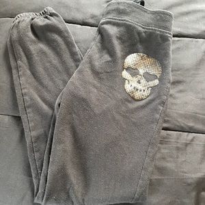 No boundaries black sweatpants with gold skull
